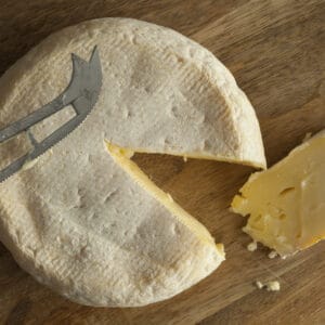 Reblochon de Savoie cheese with a slice