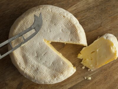 Reblochon de Savoie cheese with a slice