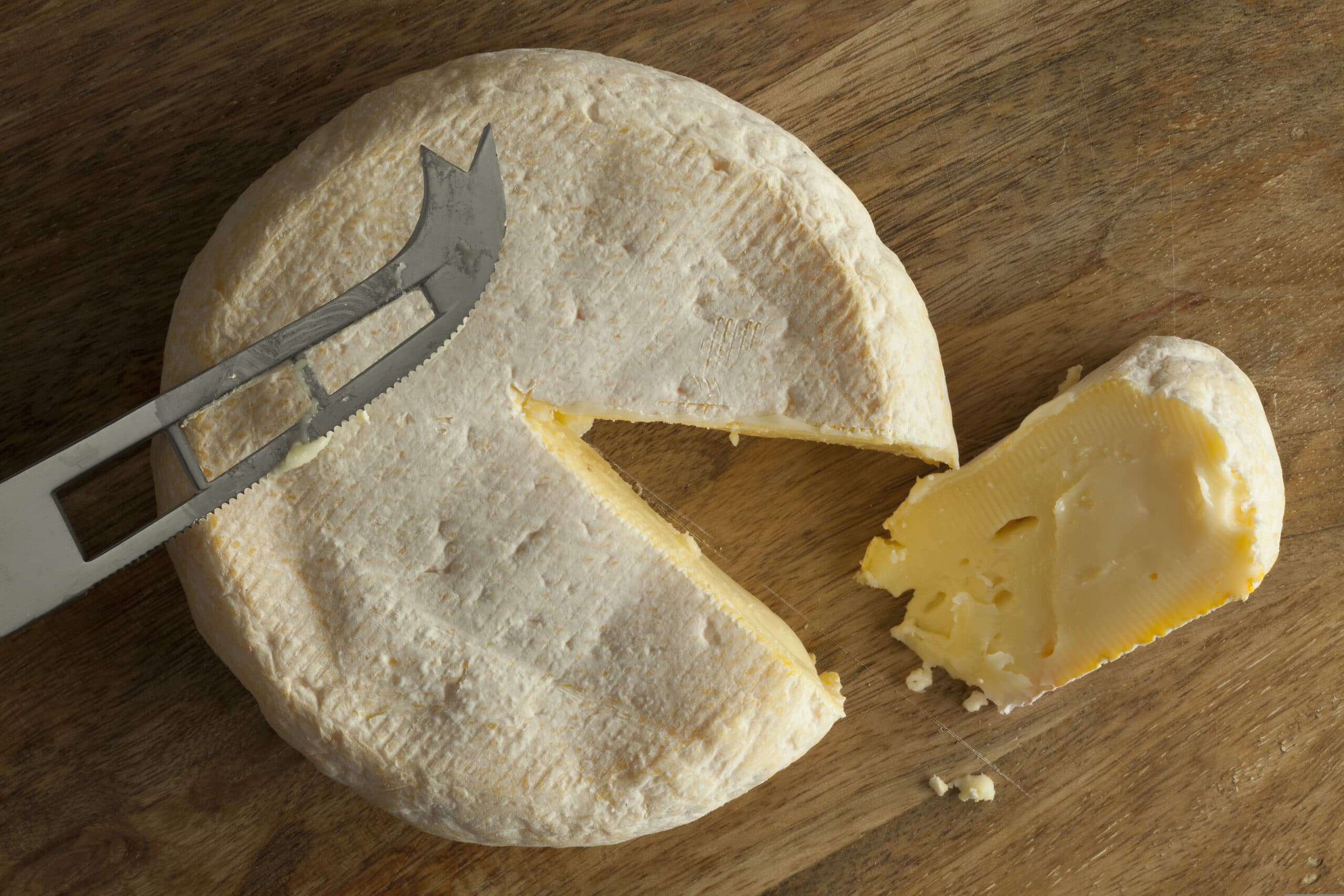 Reblochon de Savoie cheese with a slice