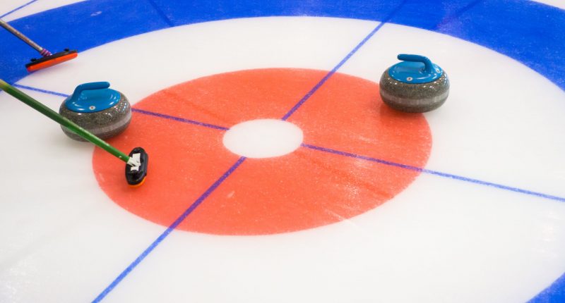 Curling,Stones,Equipment,On,The,Ice