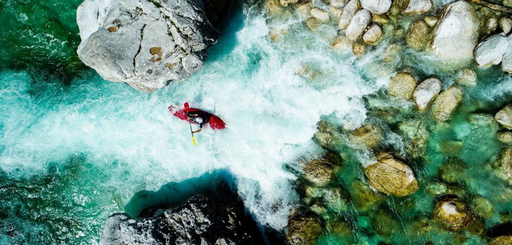 Some,Extreme,Whitewater,Kayaker,Paddling,On,The,Emerald,Waters,Of