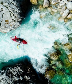 Some,Extreme,Whitewater,Kayaker,Paddling,On,The,Emerald,Waters,Of